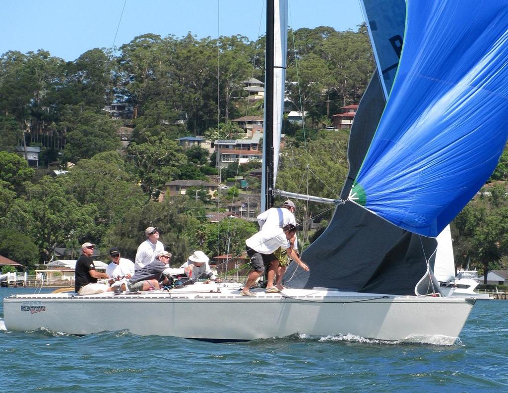 Winners Executive Decision setting the spinnaker. - Adams 10 National Championships © Mo Goodship